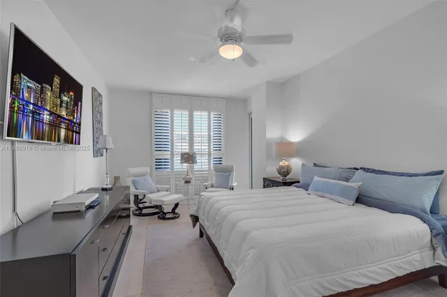 a bedroom with double bed furniture and a window