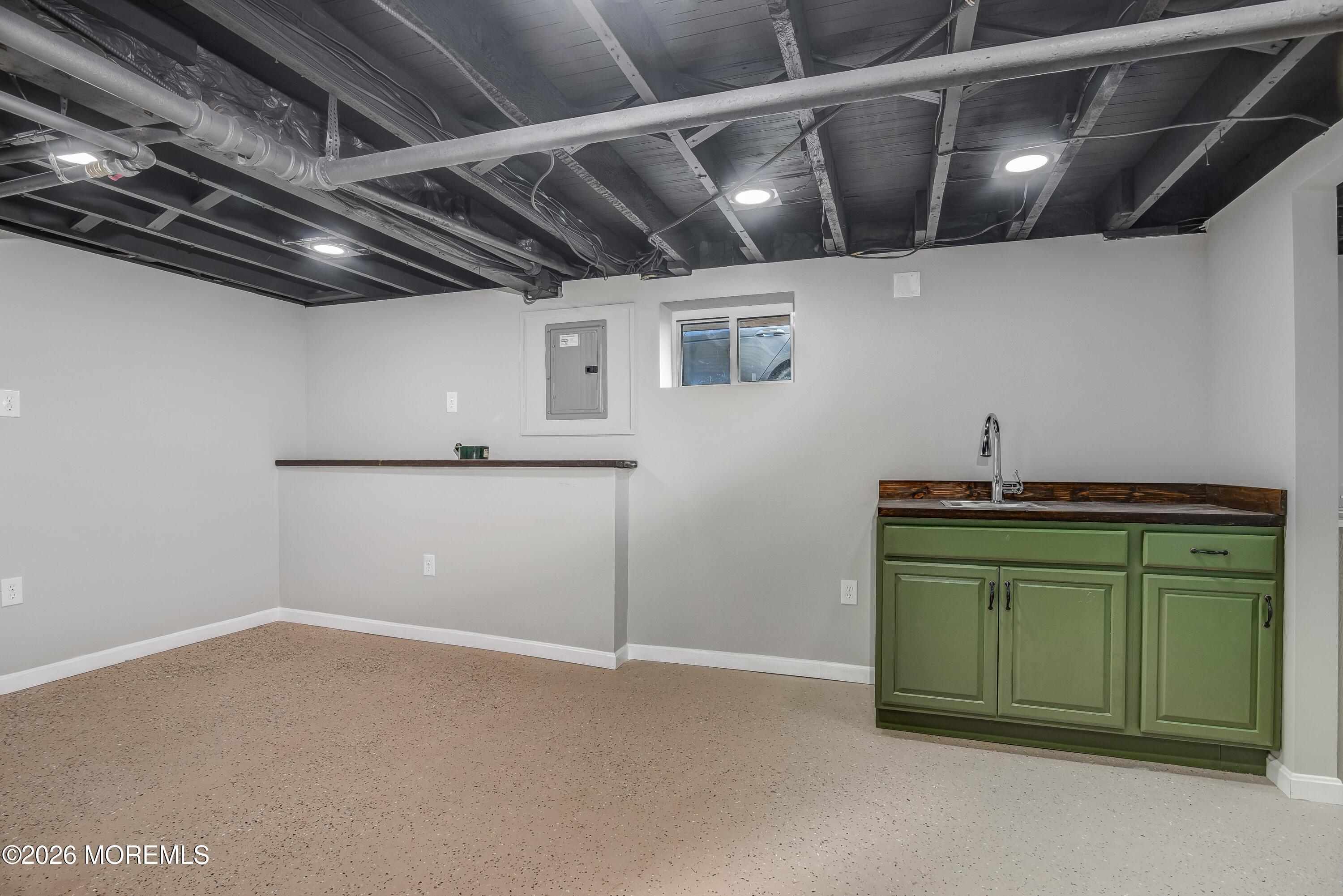 1017 Grandview Avenue Union, NJ 07083 - Photo 16 of 29 NEW Basement rec room with wet bar