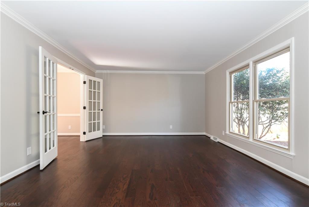 3703 Pinetop Road Greensboro, NC 27410 - Photo 11 of 30 Large Living room with new hardwood floor!