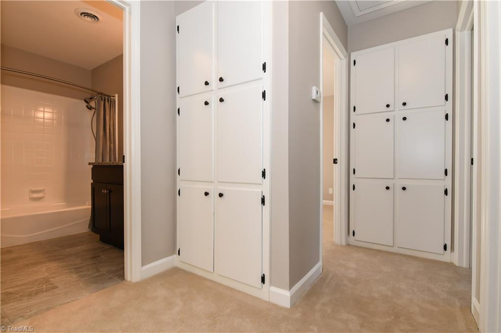 3703 Pinetop Road Greensboro, NC 27410 - Photo 23 of 30 Charming Built-in Cabinets upstairs