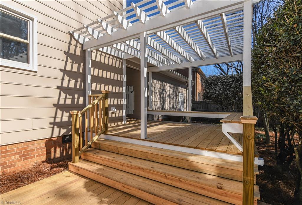 3703 Pinetop Road Greensboro, NC 27410 - Photo 27 of 30 Cozy Deck with Bench and Pergola.