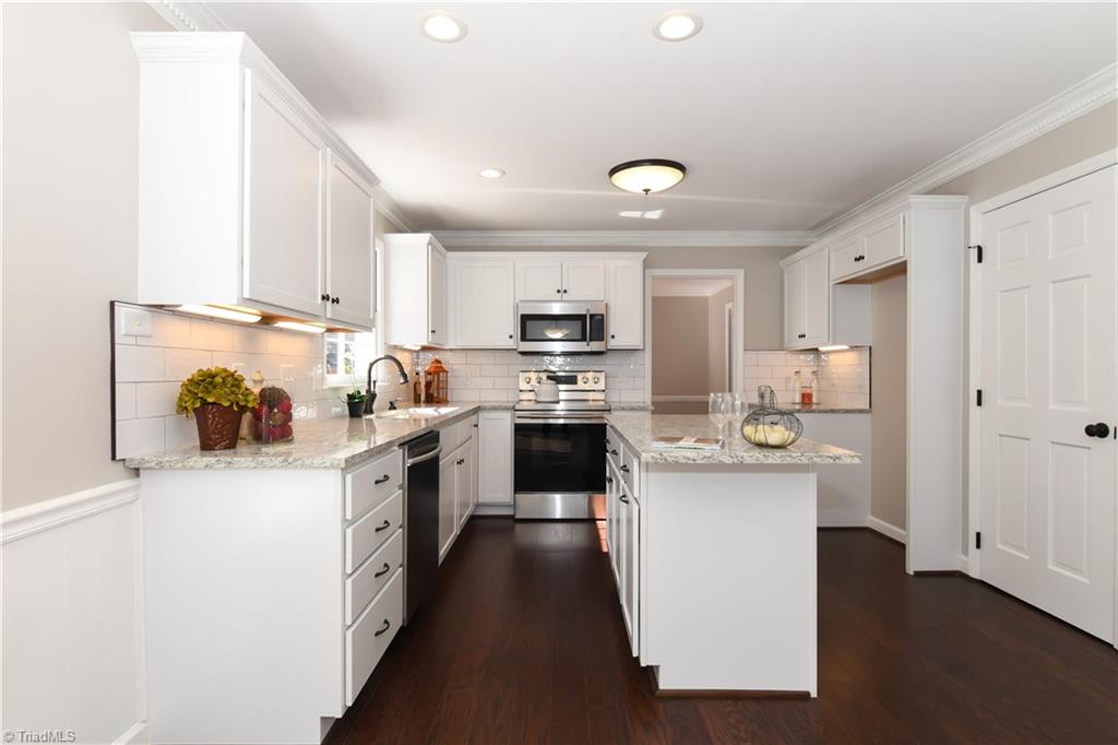 3703 Pinetop Road Greensboro, NC 27410 - Photo 4 of 30 Completely renovated kitchen with Stainless Steel Appliances!