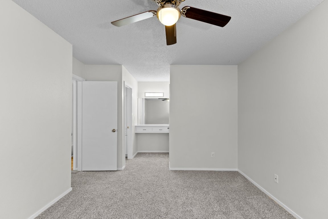 10807 Lambert Circle, Unit A Austin, TX 78758 - Photo 30 of 39 wooden floor in an empty room