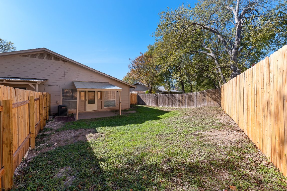 10807 Lambert Circle, Unit A Austin, TX 78758 - Photo 38 of 39 a view of a back yard of the house