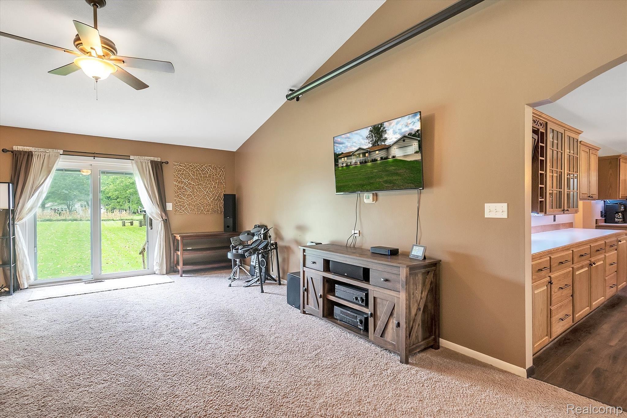 22115 Haggerty Road Belleville, MI 48111 - Photo 17 of 47 LIVING ROOM/DOOR WALL TO YARD