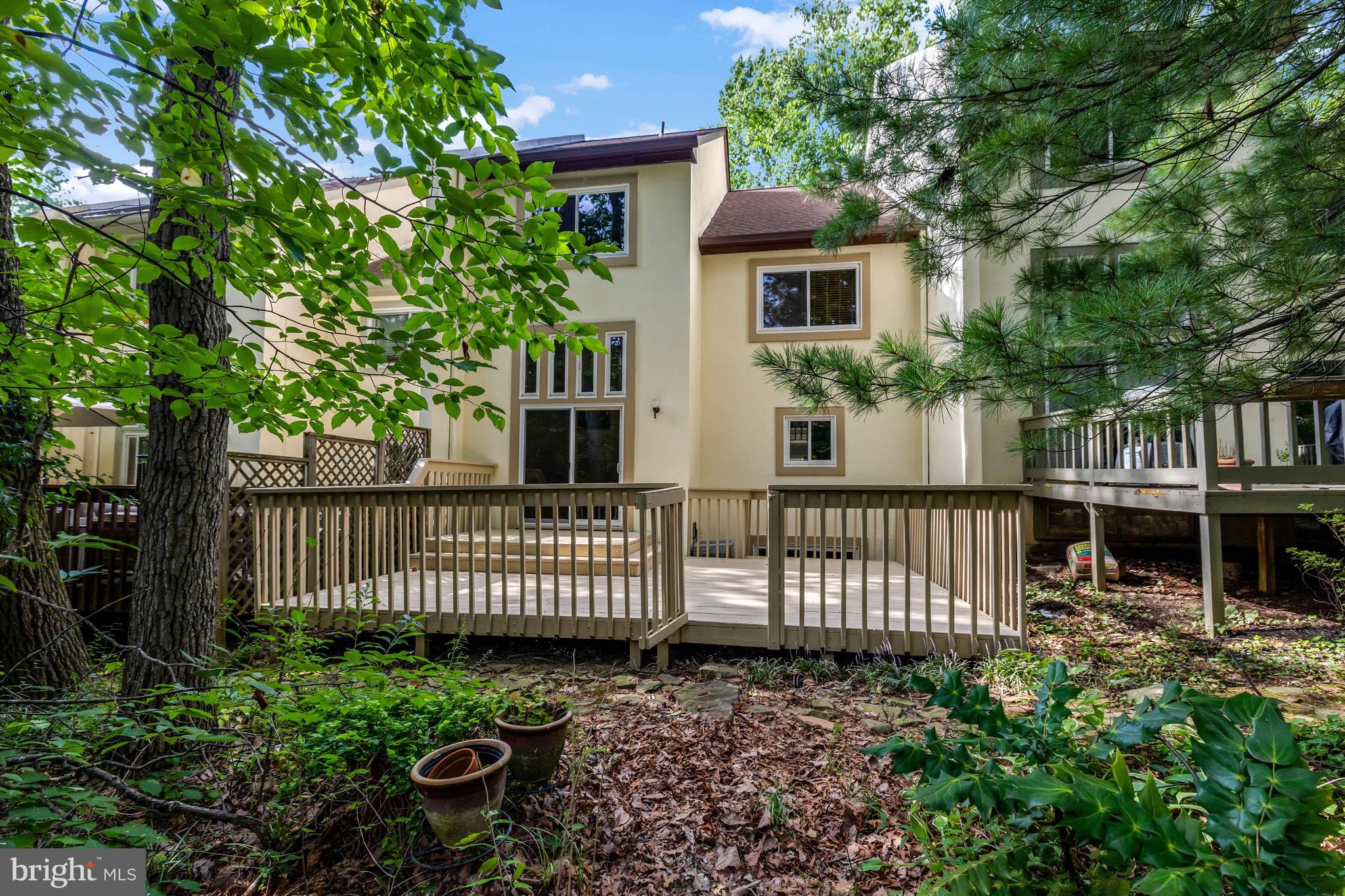 1591 Inlet Court Reston, VA 20190 - Photo 25 of 67 The fenced deck backs to trees.