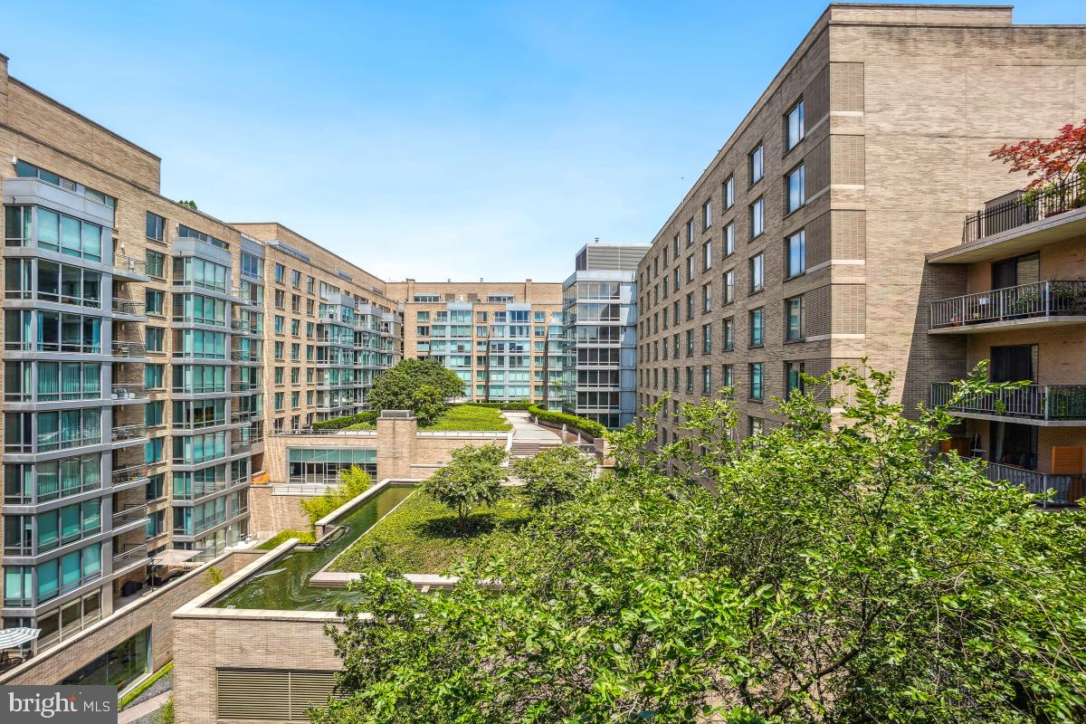 a view of a tall building from a balcony