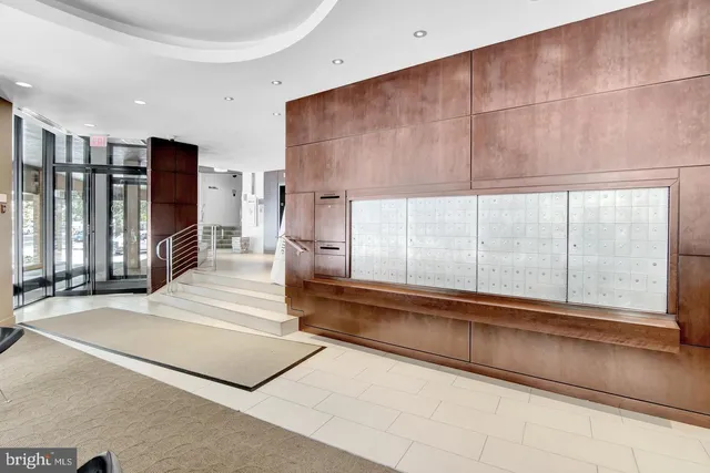 a spacious bathroom with a large tub and shower