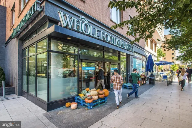 a view of a building with sitting area