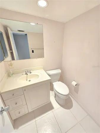 a view of a hallway with closet area