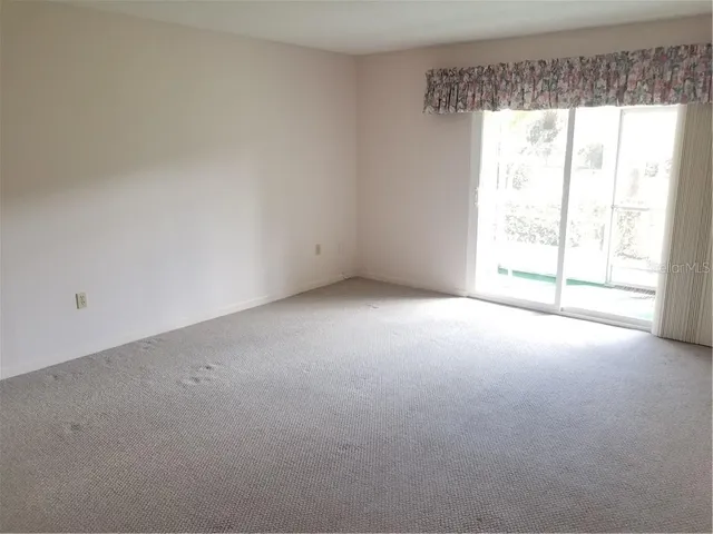 a view of empty room with window