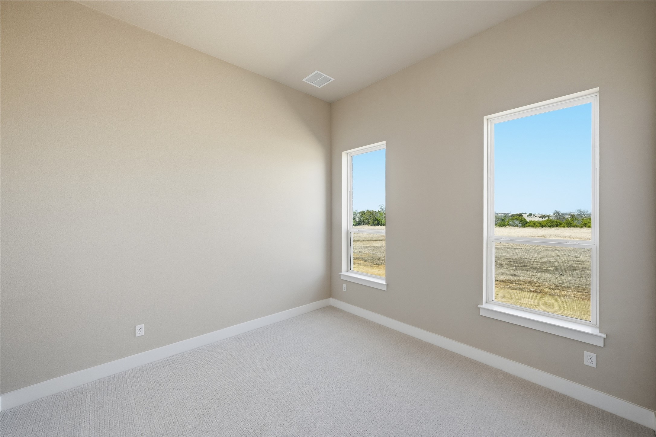 1209 Doelling Drive Georgetown, TX 78633 - Photo 21 of 31 Spare room featuring carpet flooring and baseboards