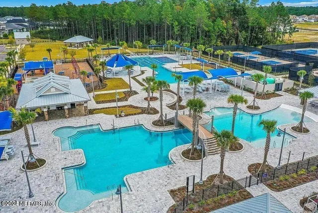 a view of gym equipment with outdoor seating