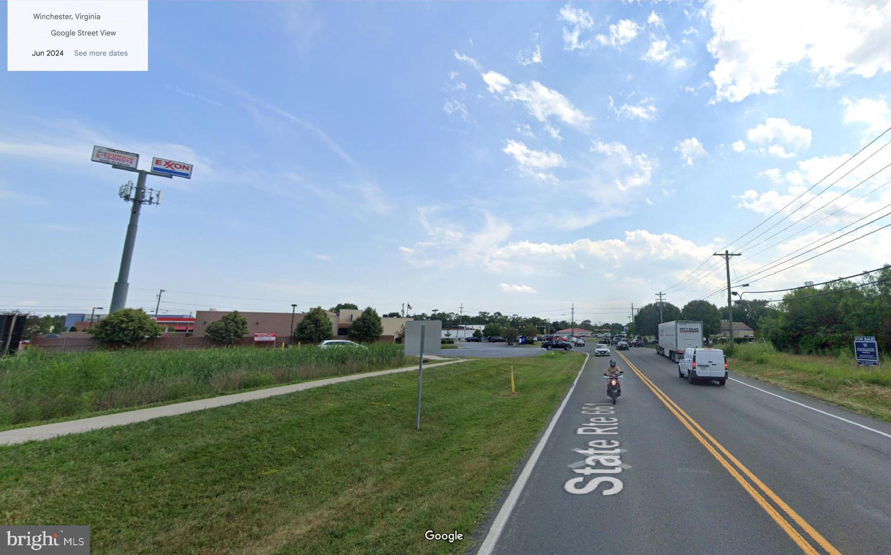 153 Welltown Road Winchester, VA 22603 - Photo 5 of 12 a view of a golf course with a lake