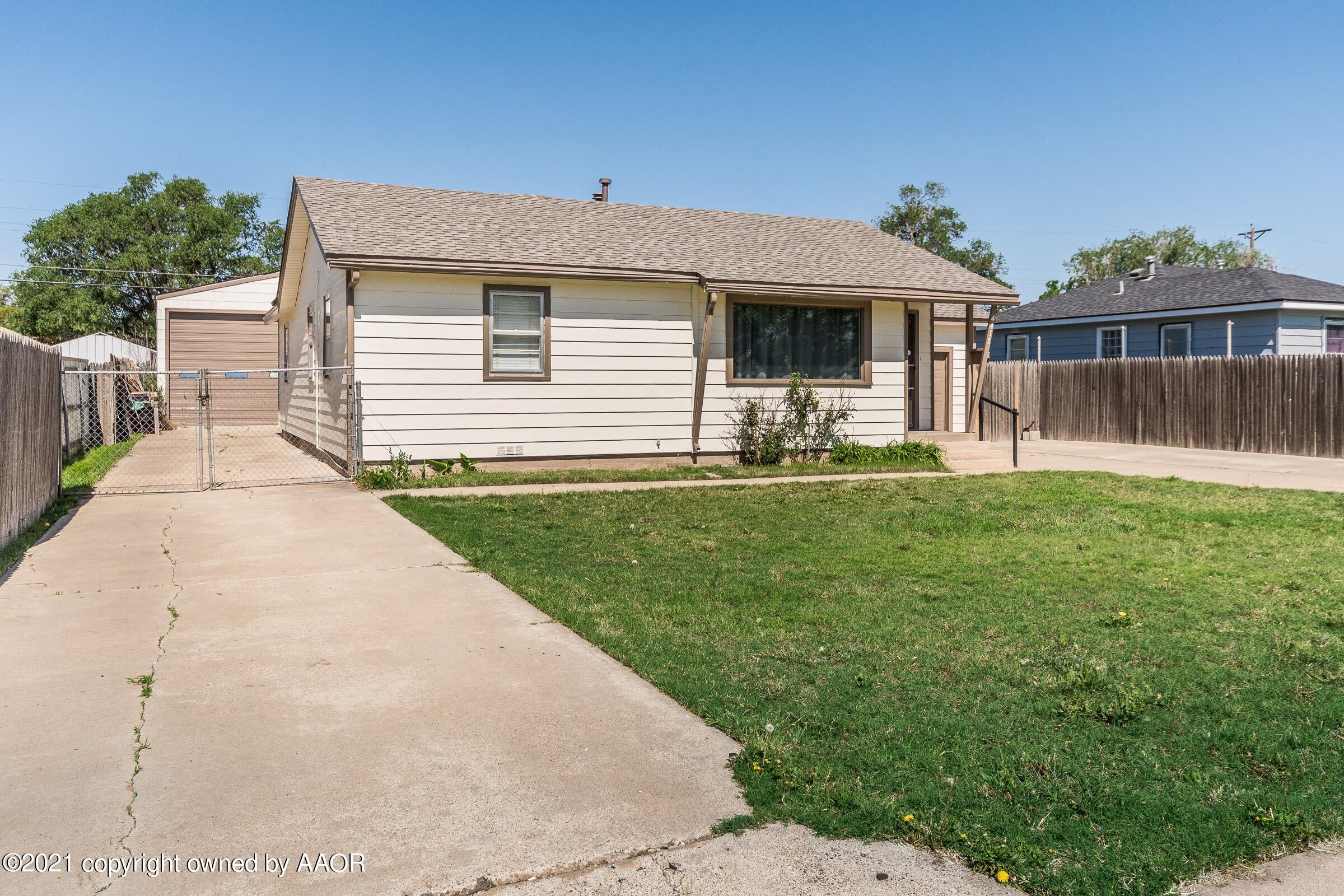 4412 South Lipscomb Street Amarillo, TX 79110 - Photo 1 of 18 a front view of a house with a yard