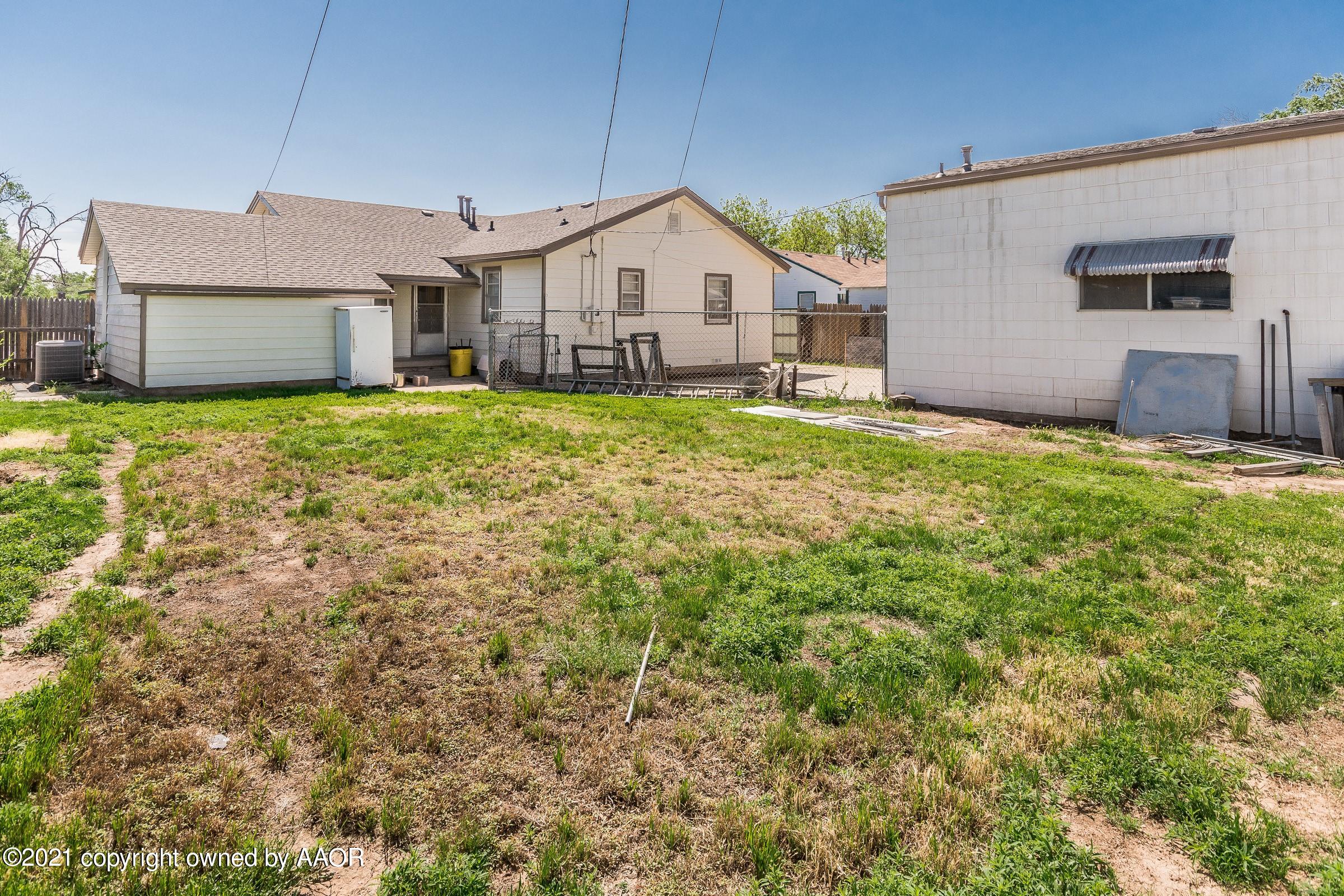 4412 South Lipscomb Street Amarillo, TX 79110 - Photo 17 of 18 a view of a house with a yard and garage