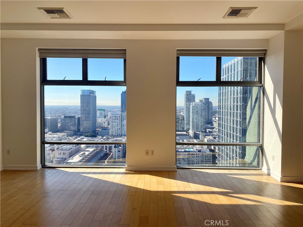 801 South Grand Avenue, Unit 2212 Los Angeles, CA 90017 - Photo 1 of 23 a view of a living room and window