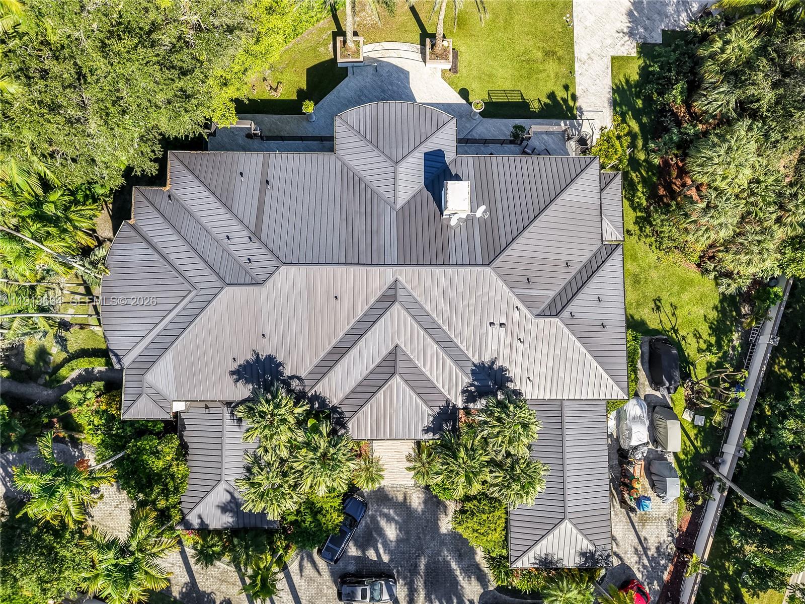 10395 Southwest 67th Avenue Pinecrest, FL 33156 - Photo 14 of 94 an aerial view of a house