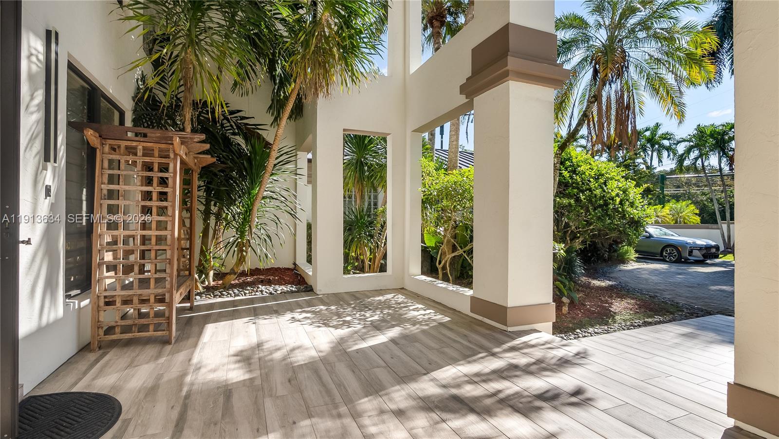 10395 Southwest 67th Avenue Pinecrest, FL 33156 - Photo 17 of 94 a view of a backyard of the house