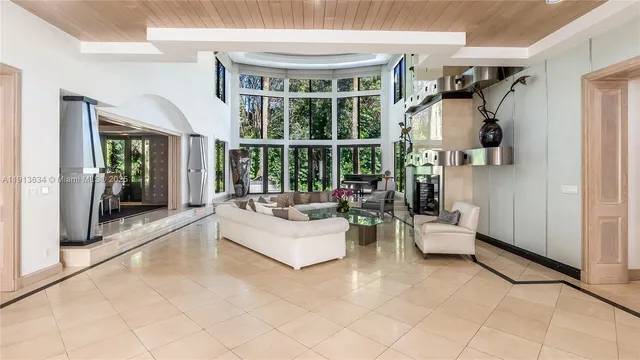a kitchen with a refrigerator stove and microwave
