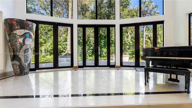 a bathroom with a sink mirror toilet and shower