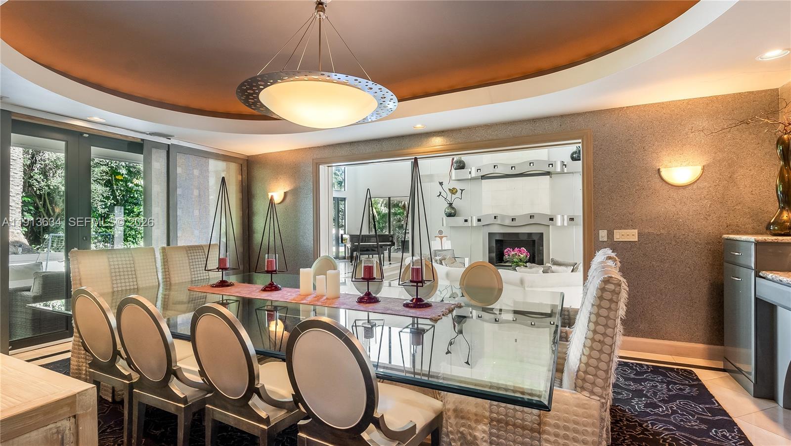 10395 Southwest 67th Avenue Pinecrest, FL 33156 - Photo 30 of 94 a dining room with furniture window and outside view