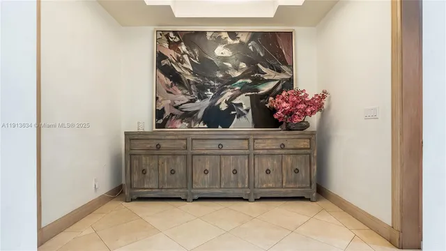 a kitchen with stainless steel appliances kitchen island granite countertop a refrigerator and a stove