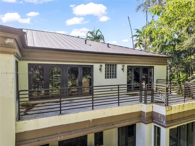 a view of a backyard of the house