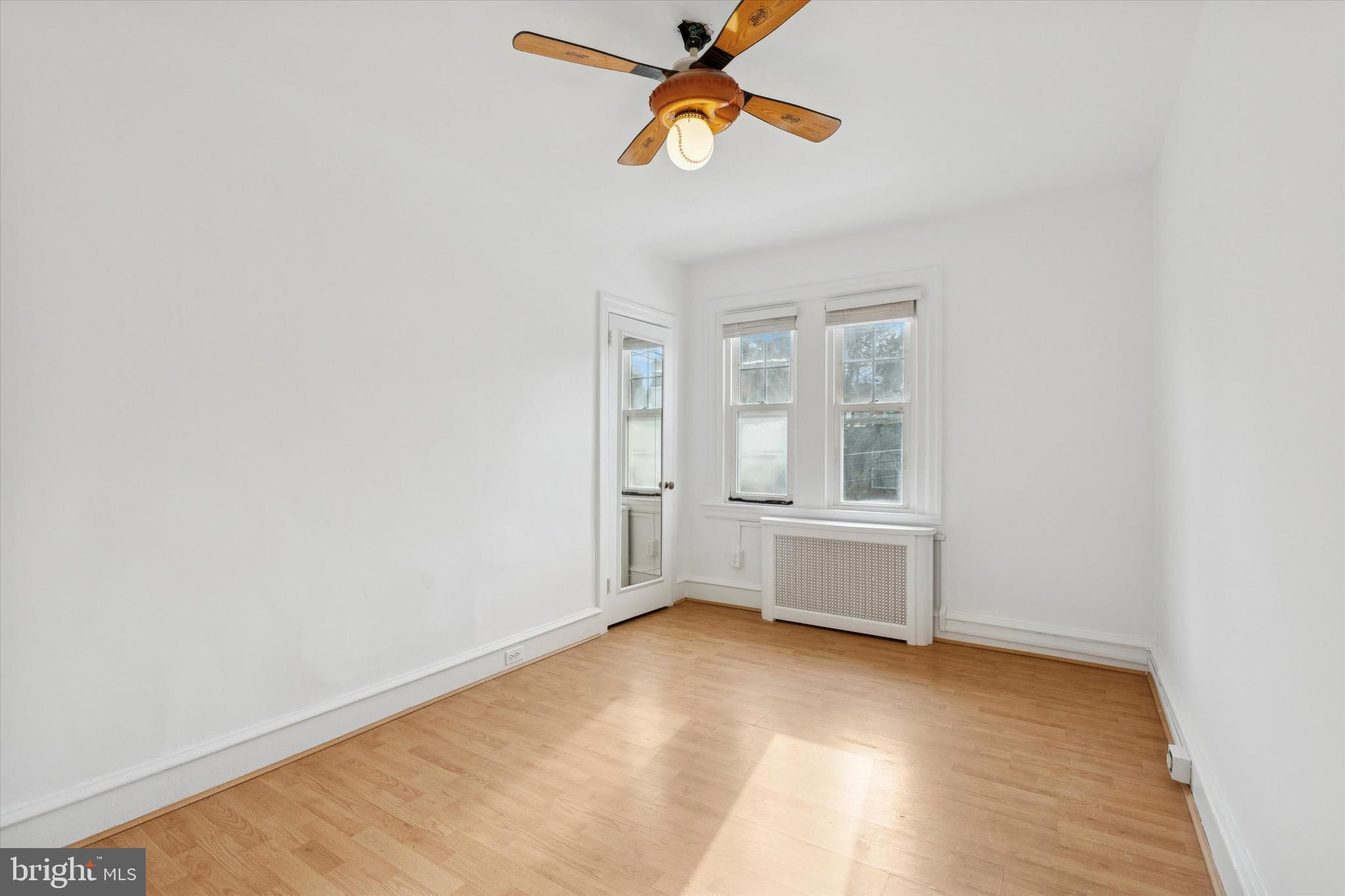 226 Upland Road Merion Station, PA 19066 - Photo 18 of 30 an empty room with windows and fan