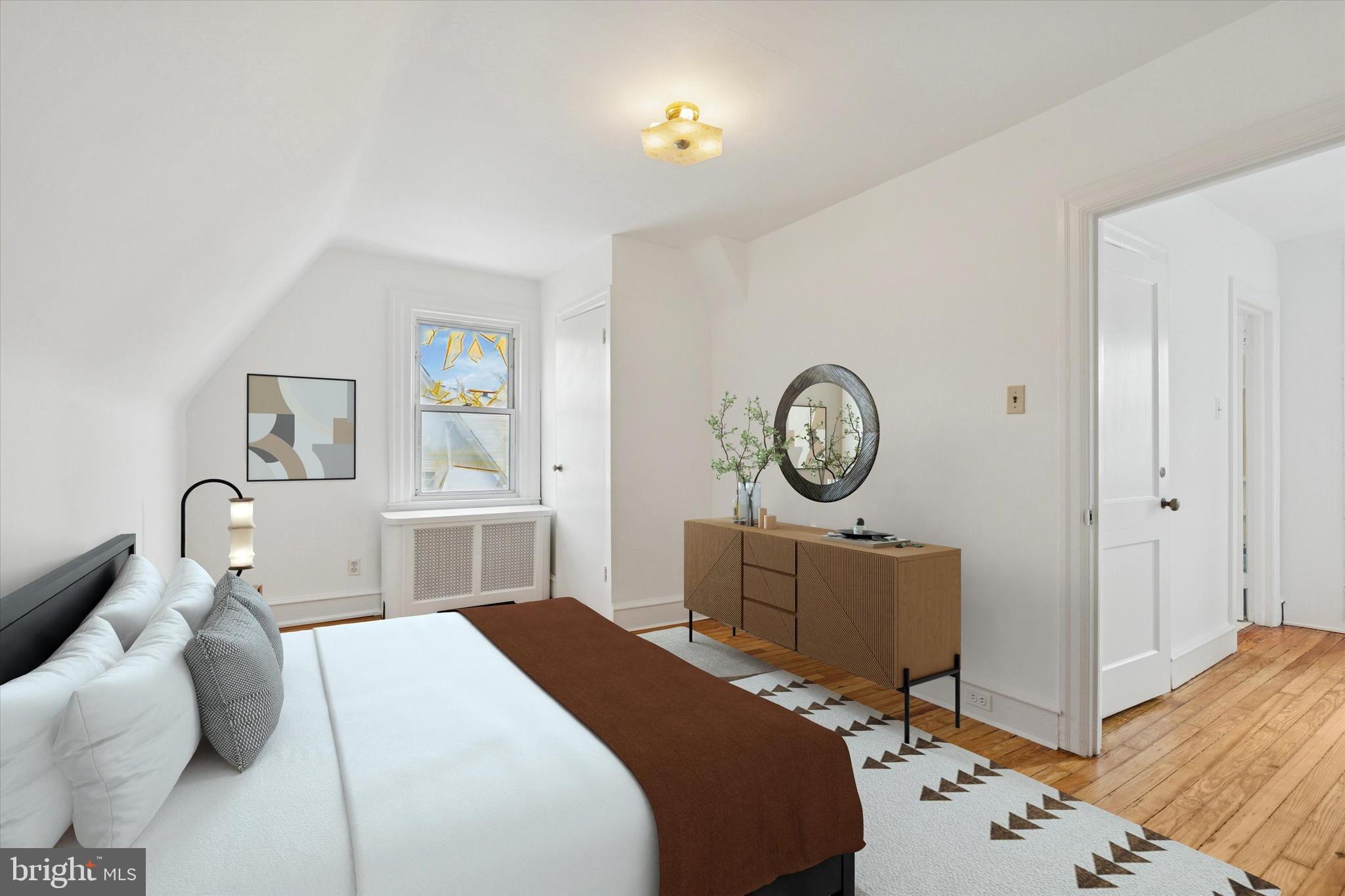 226 Upland Road Merion Station, PA 19066 - Photo 25 of 30 a bedroom with a bed and a chandelier