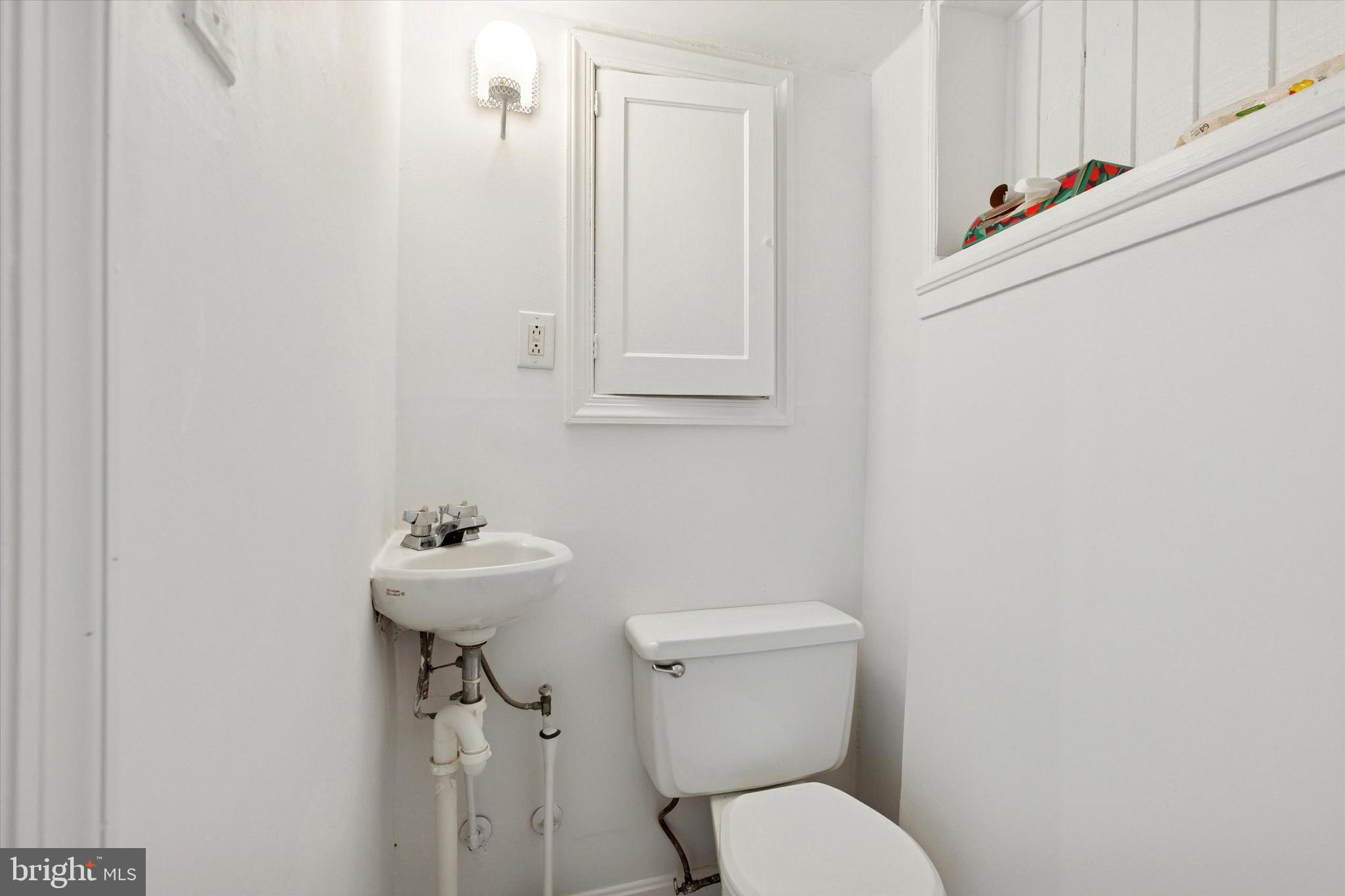 226 Upland Road Merion Station, PA 19066 - Photo 28 of 30 a white toilet sitting next to a sink