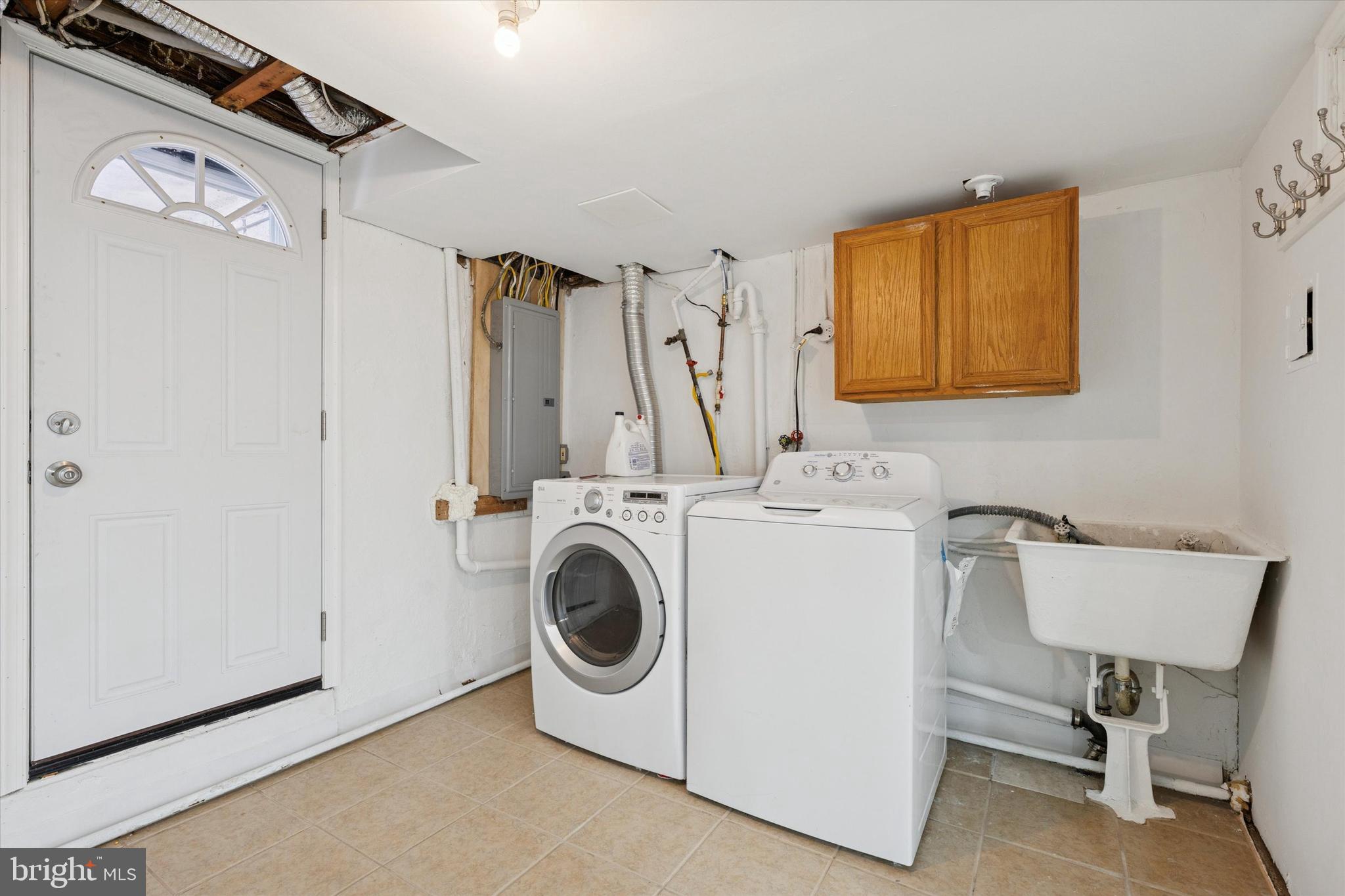226 Upland Road Merion Station, PA 19066 - Photo 29 of 30 a utility room with dryer and washer