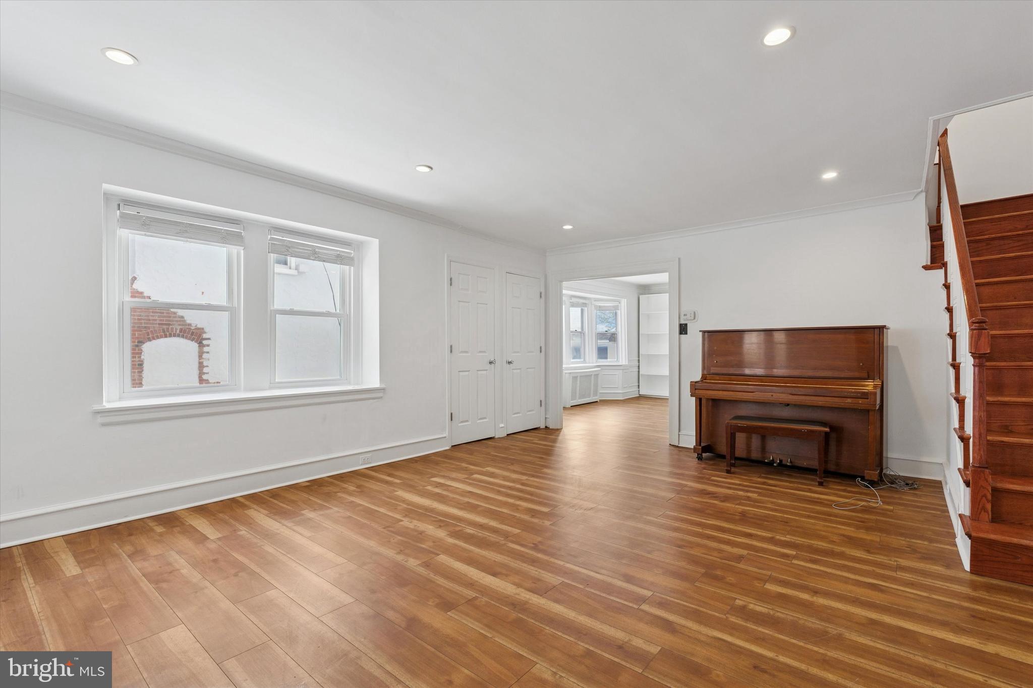 226 Upland Road Merion Station, PA 19066 - Photo 6 of 30 a living room with furniture and a flat screen tv