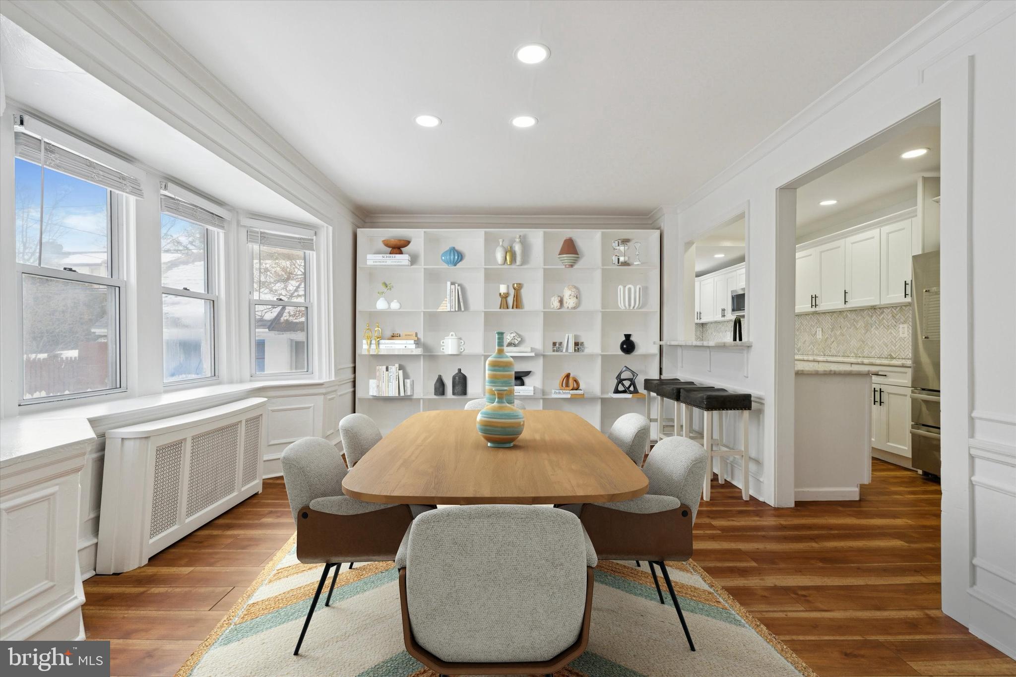 226 Upland Road Merion Station, PA 19066 - Photo 8 of 30 a view of a dining room with furniture window and wooden floor