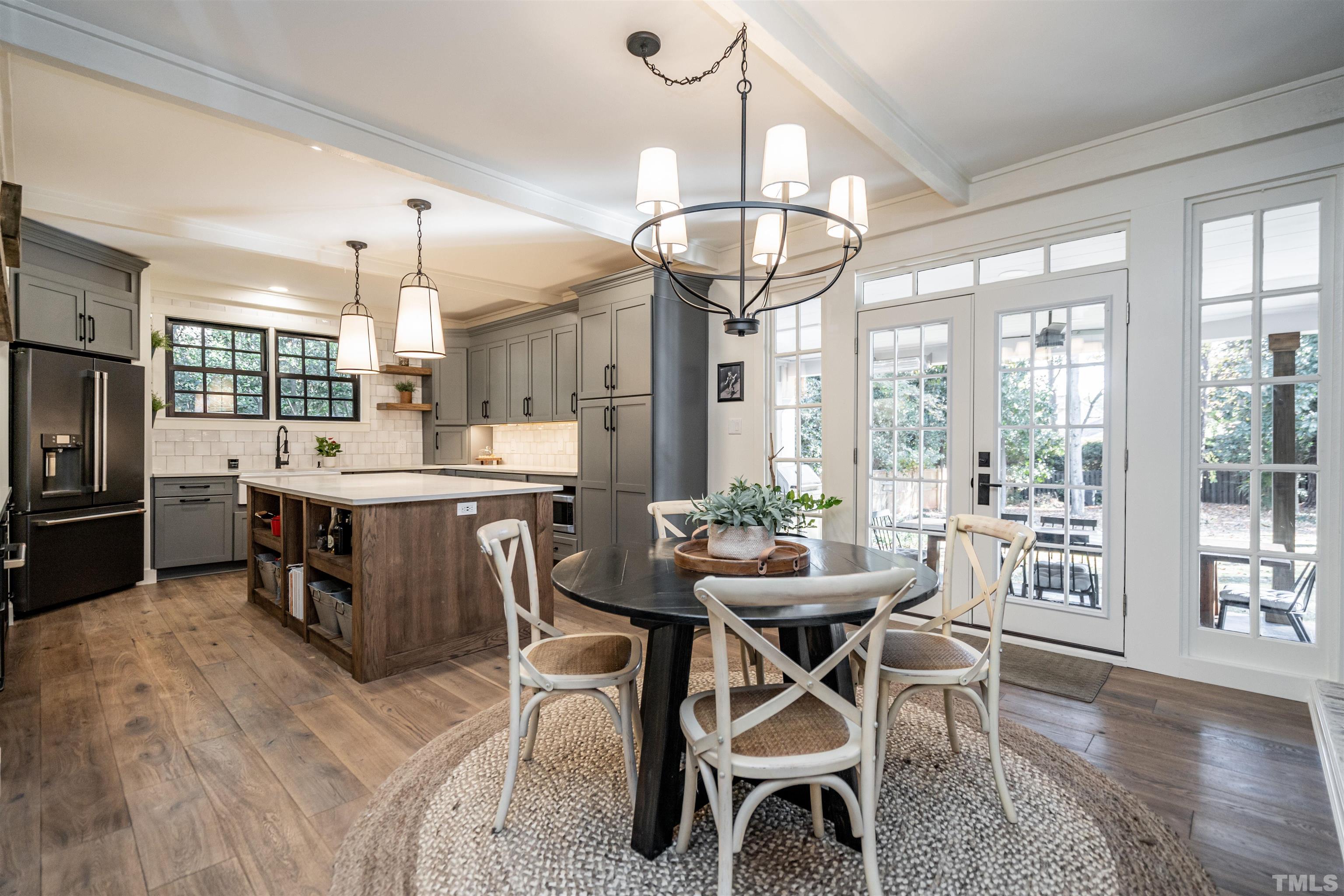 2412 Ridge Road Raleigh, NC 27612 - Photo 11 of 43 a view of a dining room with furniture window and wooden floor