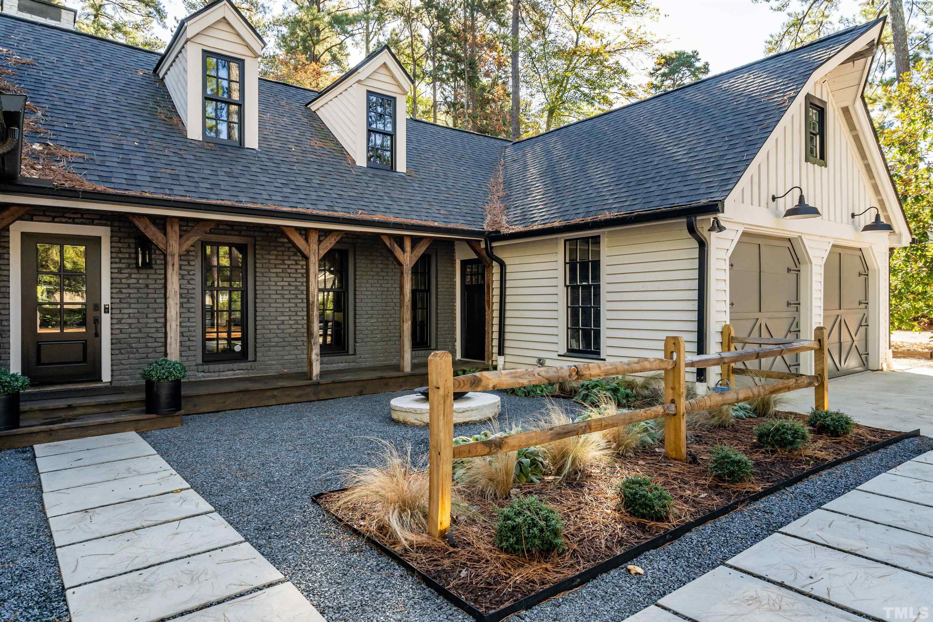 2412 Ridge Road Raleigh, NC 27612 - Photo 3 of 43 a front view of a house with garden