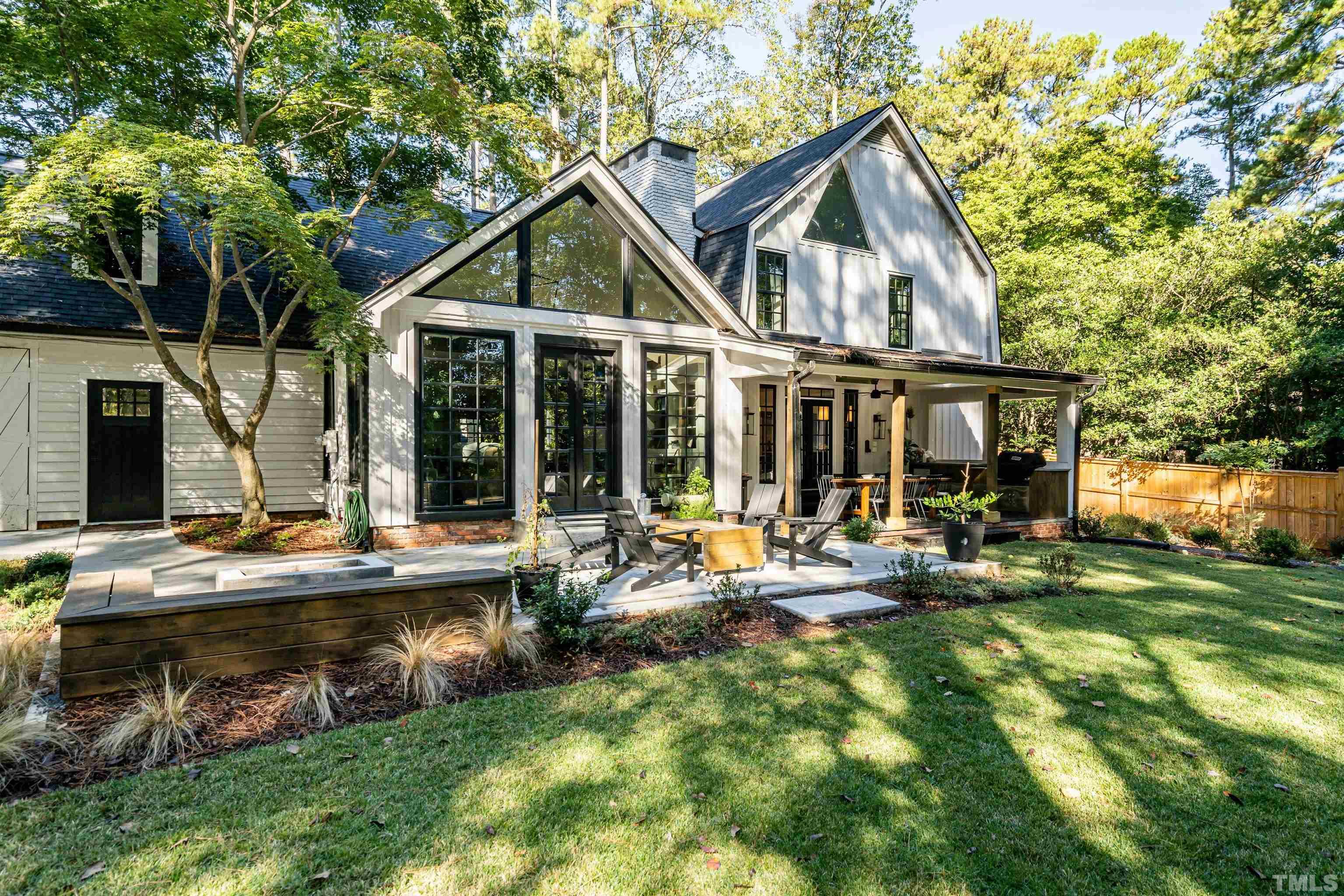 2412 Ridge Road Raleigh, NC 27612 - Photo 42 of 43 a front view of house with yard outdoor seating and green space