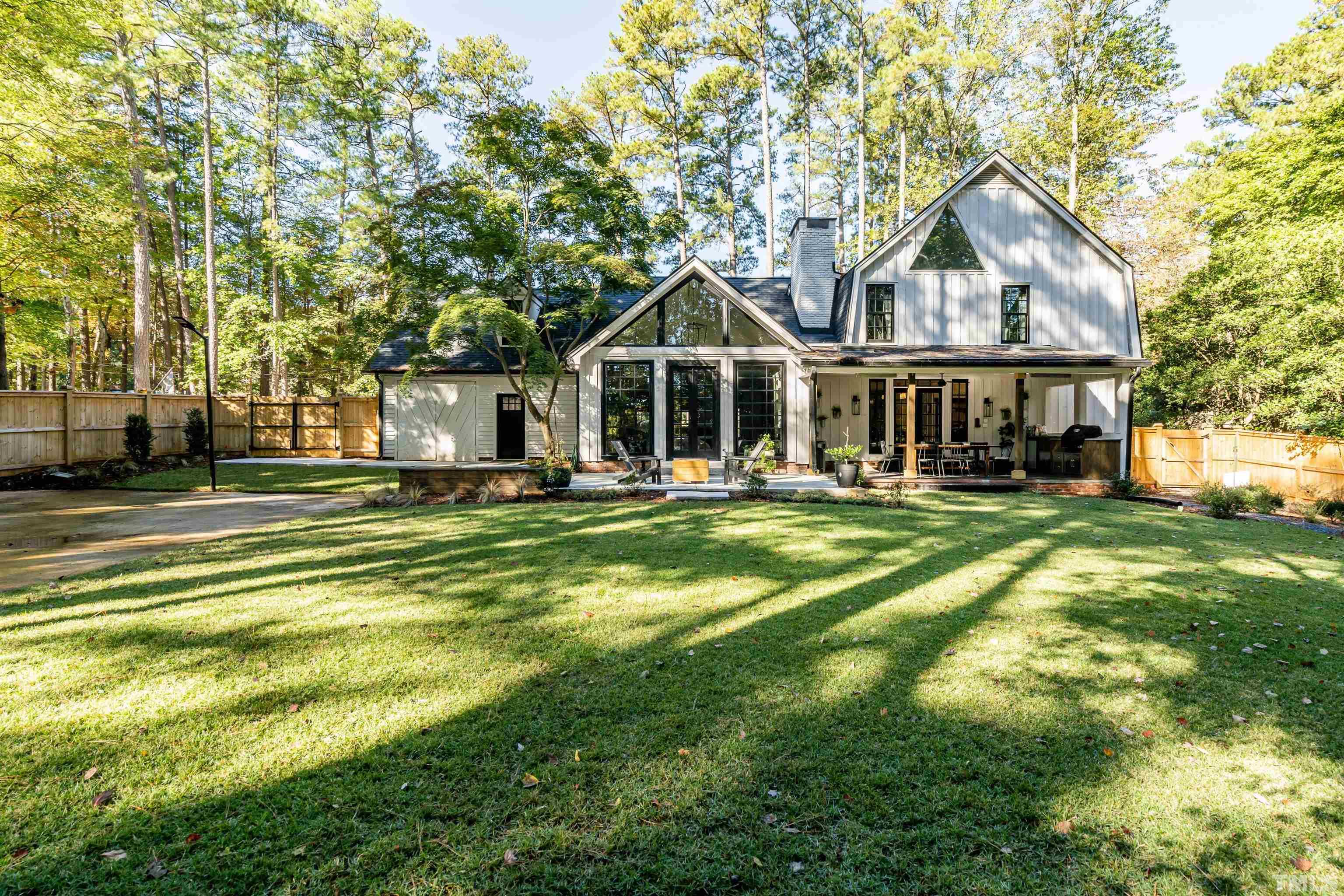 2412 Ridge Road Raleigh, NC 27612 - Photo 43 of 43 a front view of a house with a yard