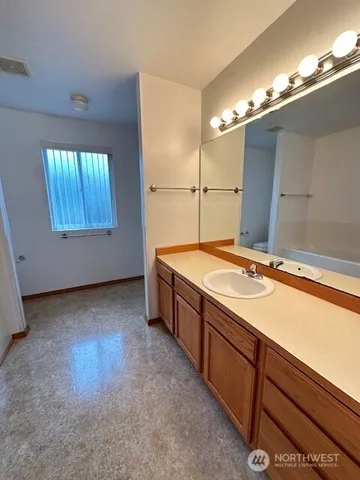 a view of a room with an empty shelf