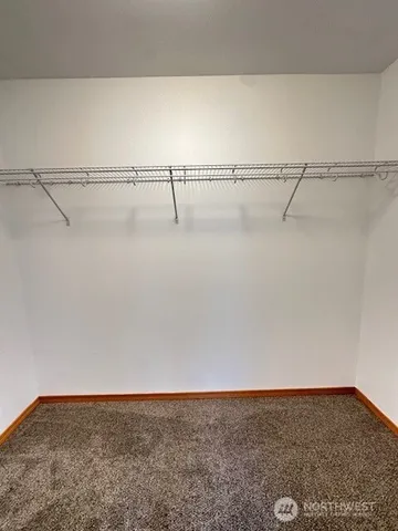 a bathroom with a sink double vanity and a mirror