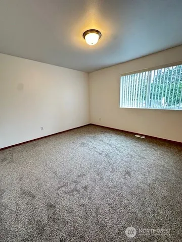 a view of small space with racks on the wall