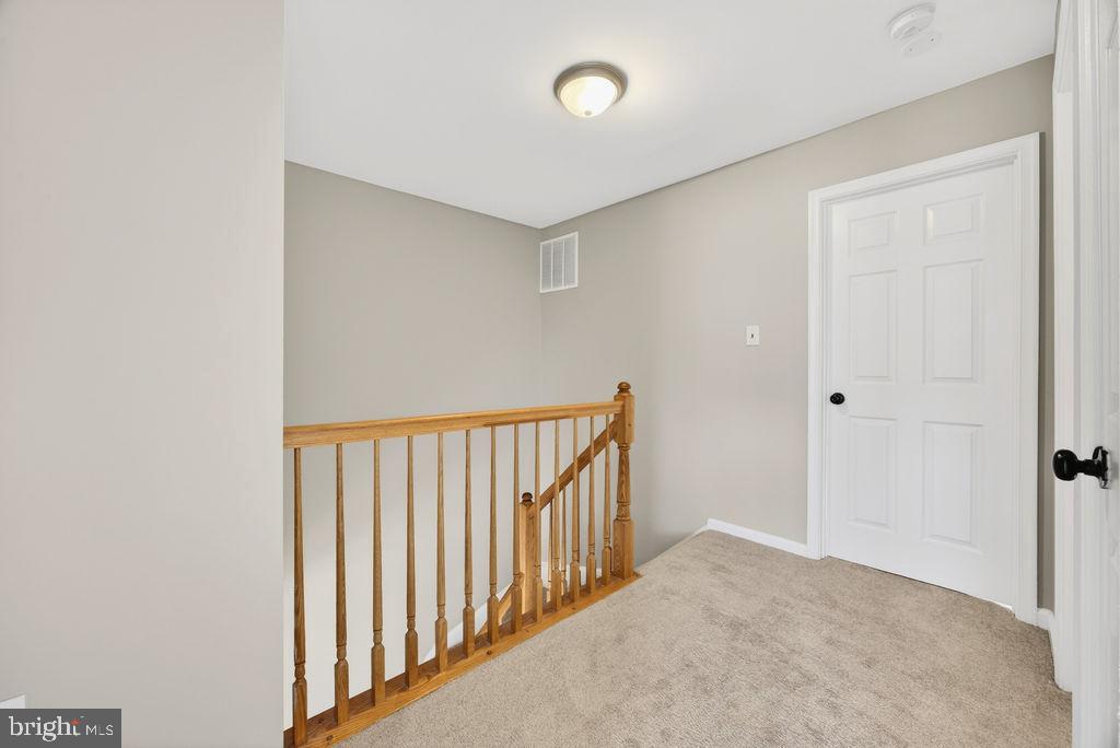 43249 Clearnight Terrace Ashburn, VA 20147 - Photo 20 of 39 a view of a hallway with a hallway