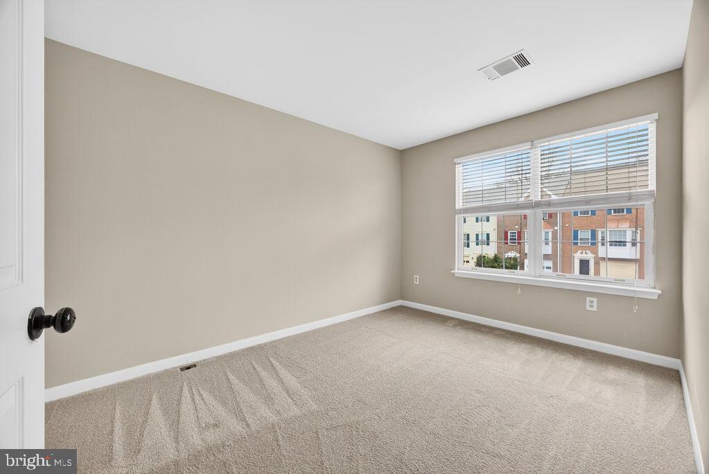 43249 Clearnight Terrace Ashburn, VA 20147 - Photo 29 of 39 an empty room with a window