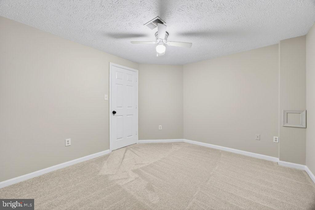 43249 Clearnight Terrace Ashburn, VA 20147 - Photo 34 of 39 wooden floor in an empty room