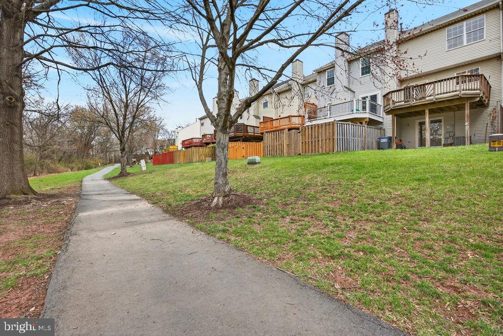 43249 Clearnight Terrace Ashburn, VA 20147 - Photo 38 of 39 a view of a yard in front of a building
