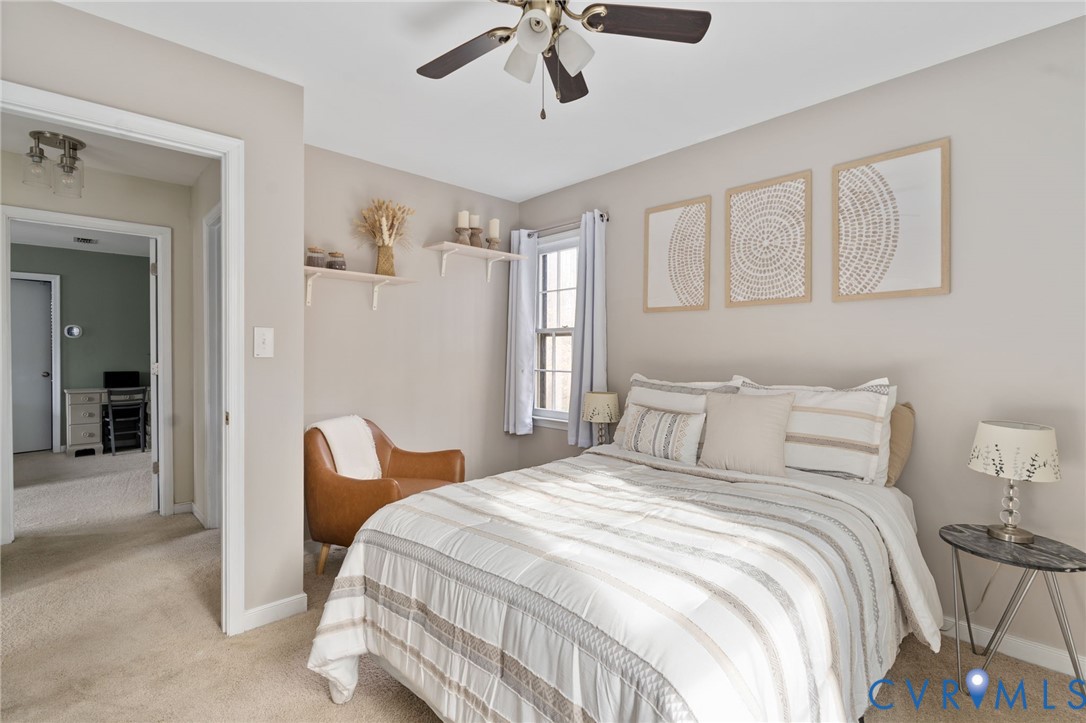 13642 Decidedly Court Midlothian, VA 23112 - Photo 28 of 35 a bedroom with a bed and a chandelier
