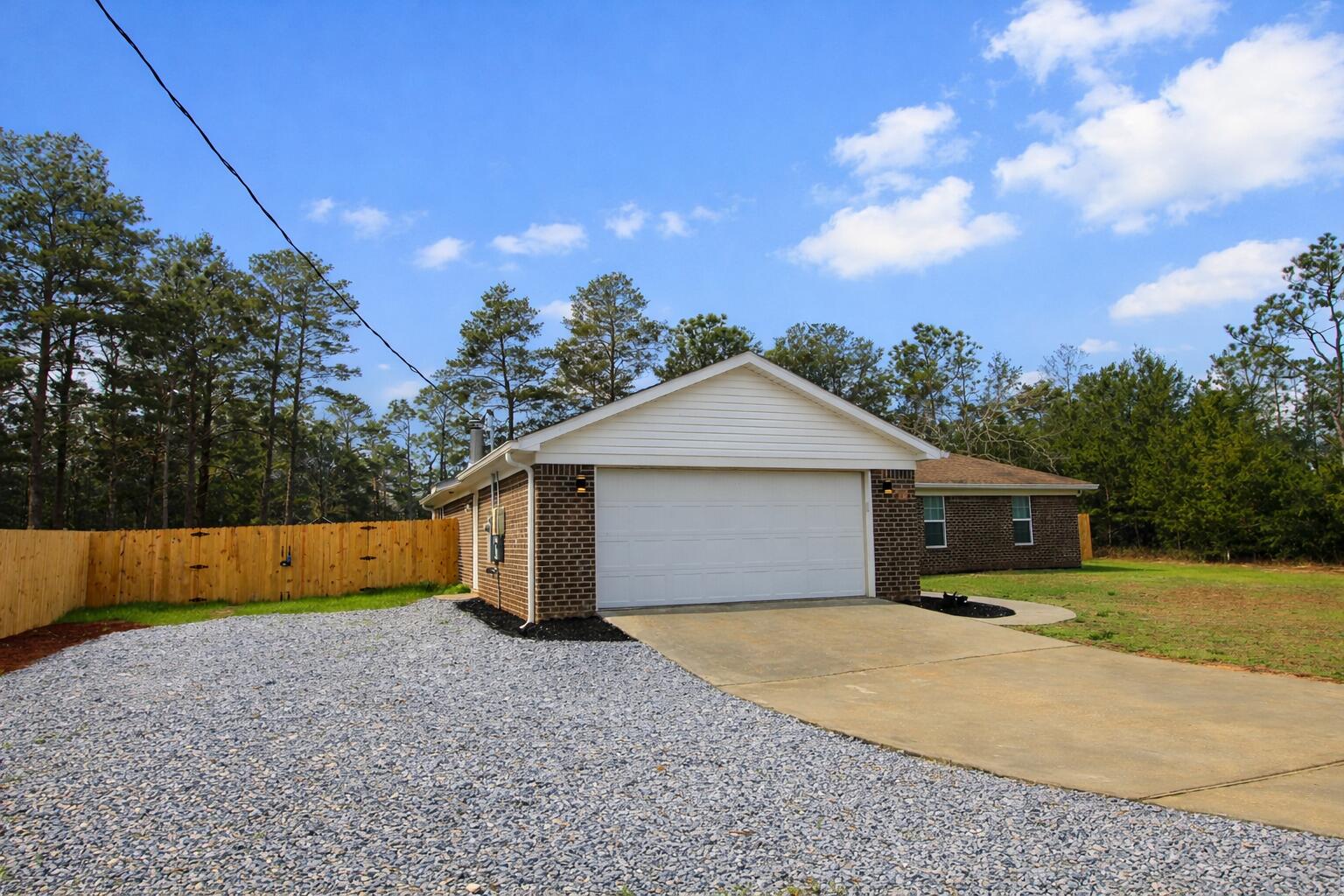 4052 Randi Road Crestview, FL 32539 - Photo 2 of 27 a front view of a house with a yard