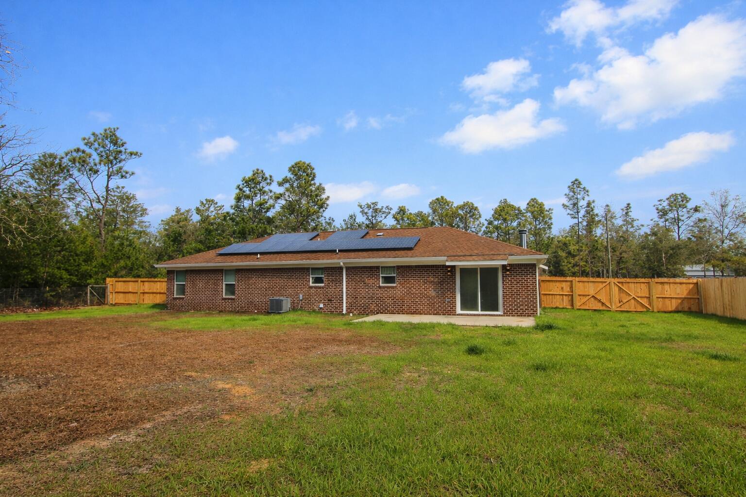 4052 Randi Road Crestview, FL 32539 - Photo 27 of 27 a view of a house with a yard