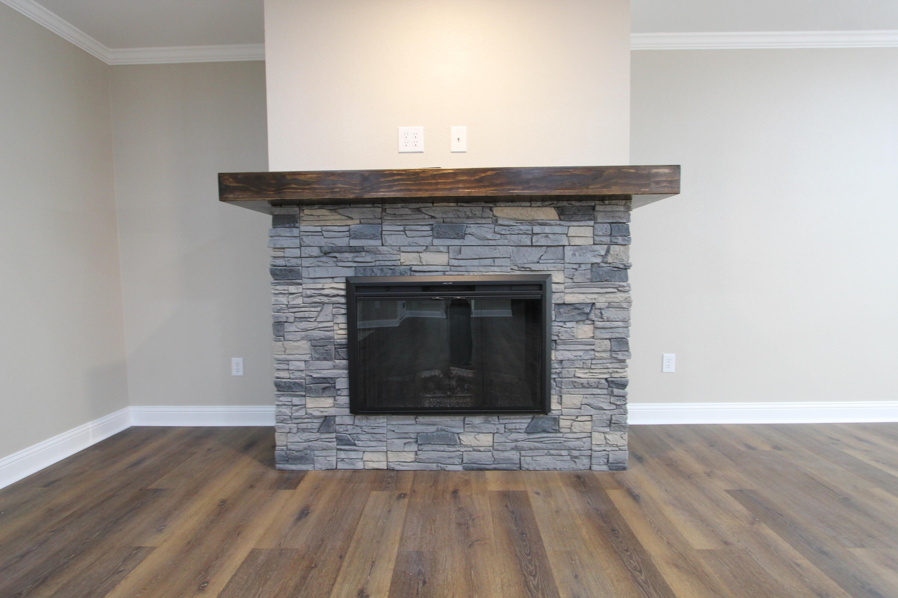 4052 Randi Road Crestview, FL 32539 - Photo 9 of 27 a living room with a fireplace