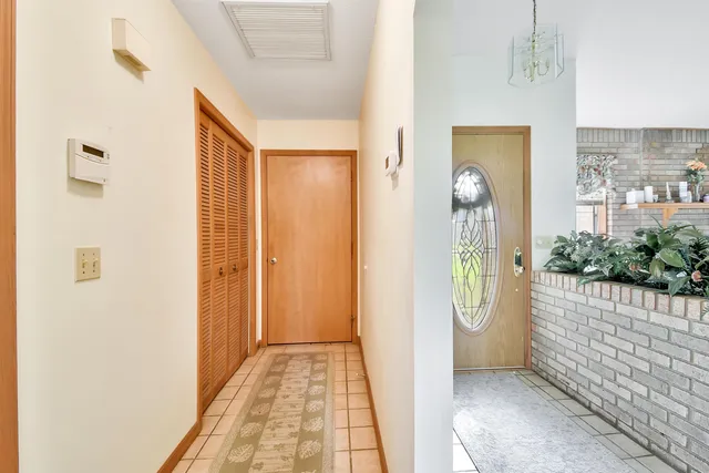 a view of a bathroom with a tub and shower